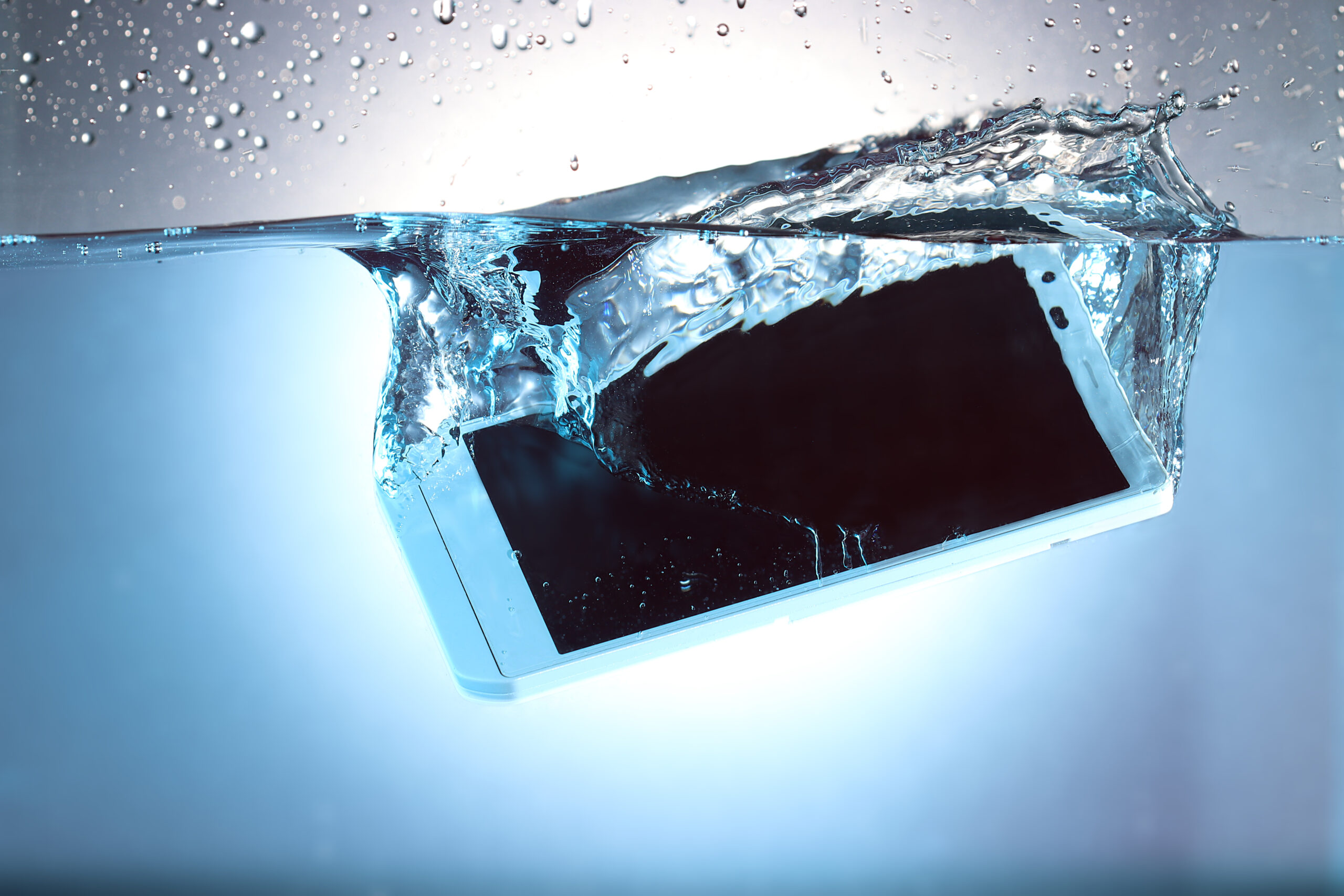 A smartphone submerged under water