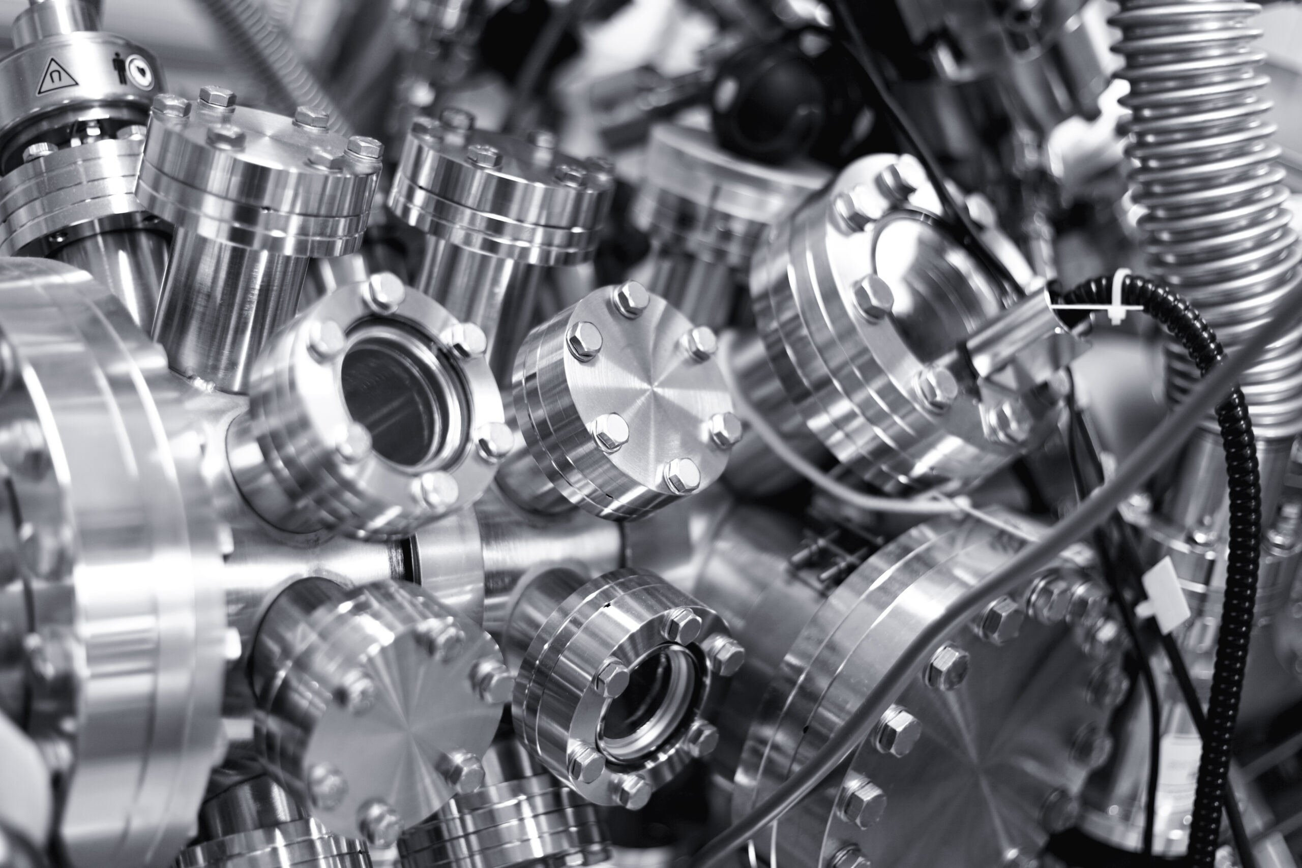 An industrial-grade silver pressure machine part of Ingress Protection testing.
